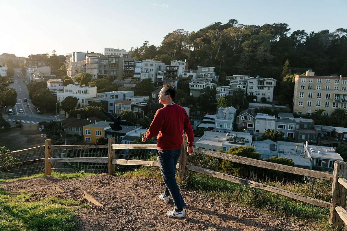 Yihao Xie, an environmental researcher in San Francisco, who says he stayed away from the office after a trip to China, walks in Corona Heights Park on Feb. 12, 2020. Though there are only a few known cases in the U.S., the coronavirus outbreak has left some Asian-Americans feeling an unsettling level of public scrutiny. (Jason Henry/The New York Times)