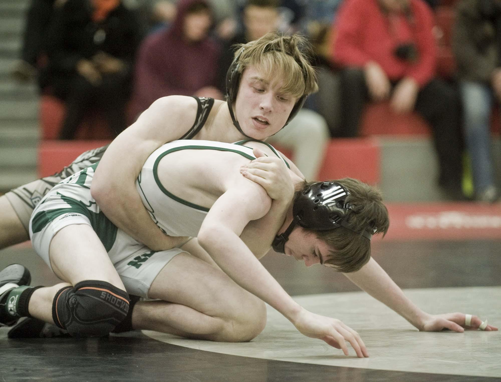 Trumbull, New Milford, Xavier claim wrestling tournament titles