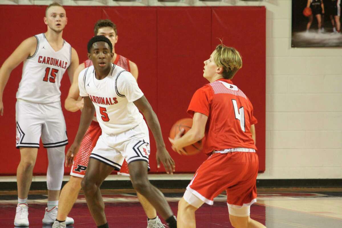 Big Rapids' Demarcus Lee (5) and the Cardinals are looking for a key win tonight.(Pioneer file photo)