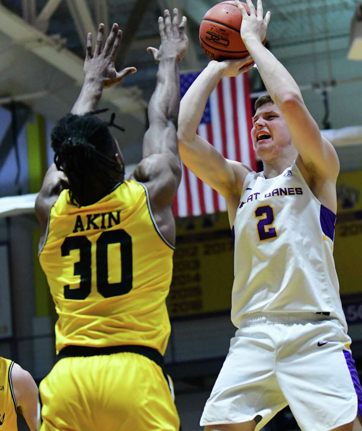 University at Albany's Trey Hutcheson takes a jump shot against Maryland-Baltimore County's Daniel Akin during a game at SEFCU Arena on Thursday, Feb. 20, 2020 in Albany, N.Y. (Lori Van Buren/Times Union)