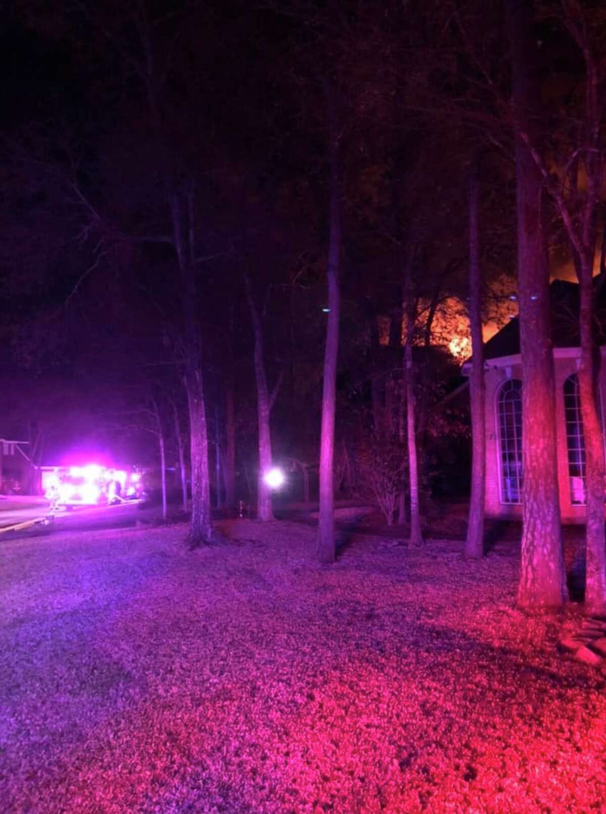 Photos: Fire in The Woodlands burns large home
