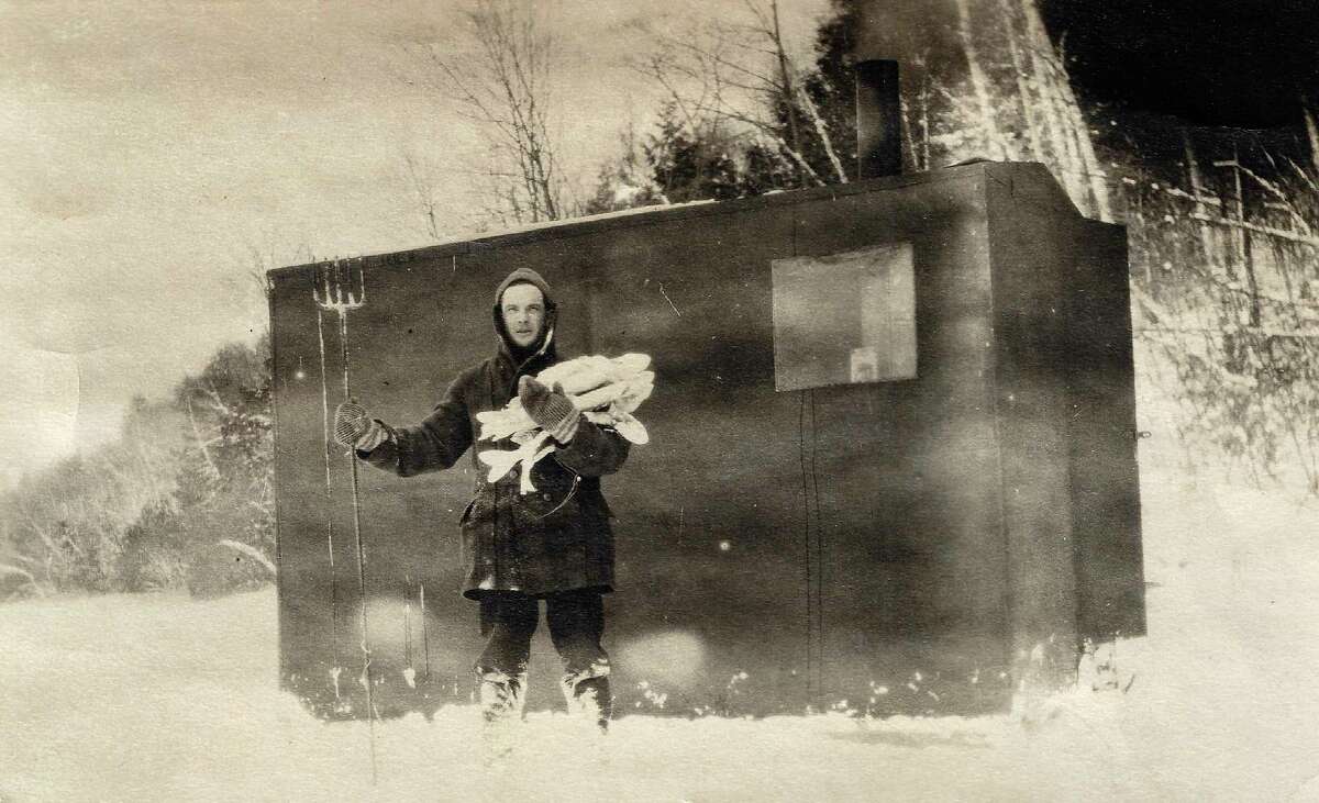 Dr. Forrest McLain after a very successful day pike spearing on Long Lake, 1915. (Courtesy photo)