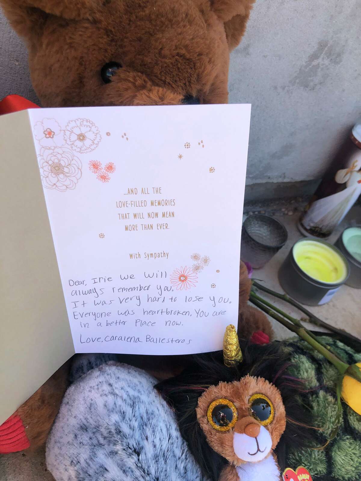 The community left stuffed animals, notes and flowers to honor Irie Suarez, a 10-year-old fifth-grade girl from Kallison Elementary who was fatally struck by a car while riding her bike to school Thursday.