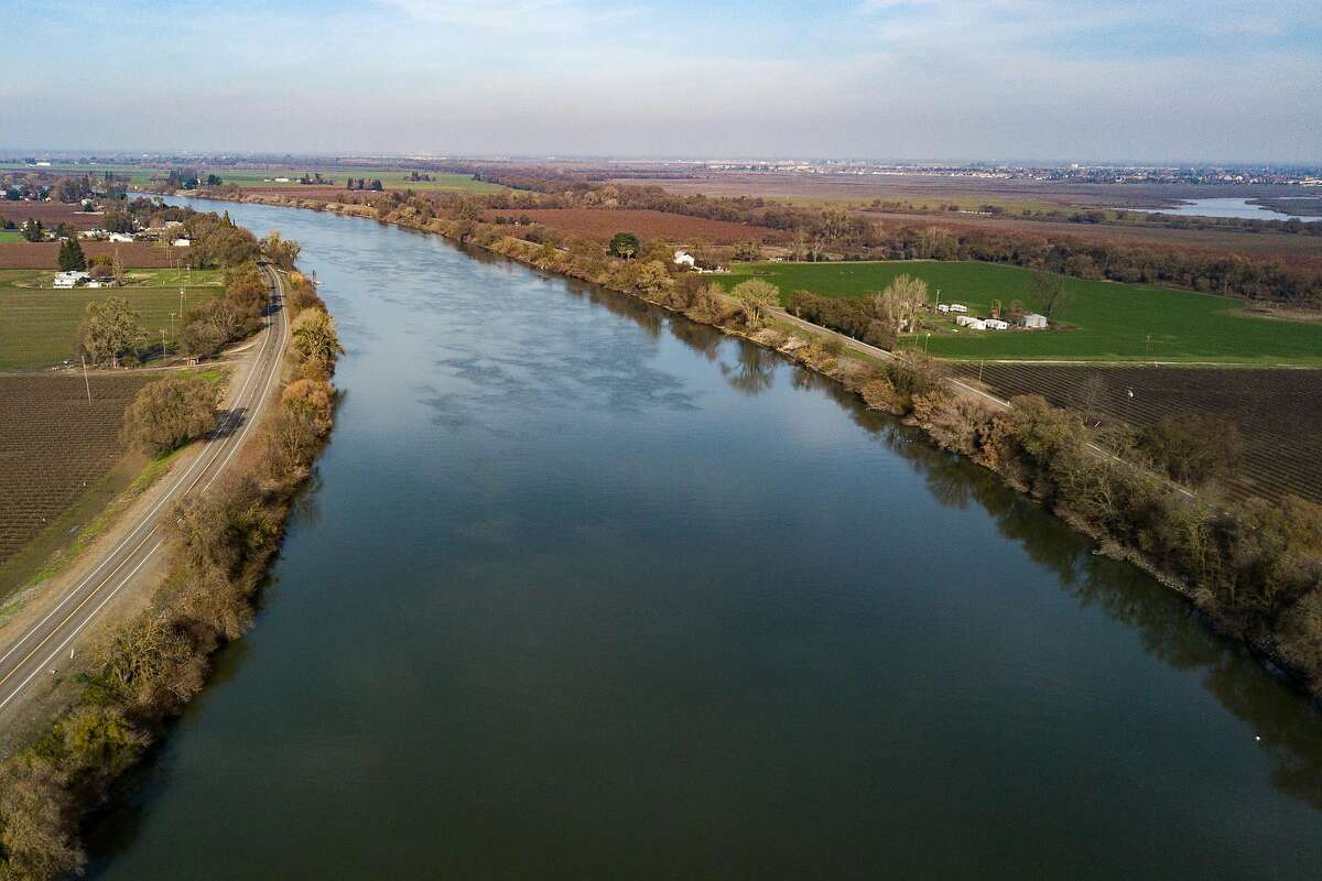 The Sacramento River, Tuesday, Dec. 31, 2019, in Clarksburg, Calif. The area is near a potential site for a new single tunnel beneath the Sacramento-San Joaquin River Delta that will help move Northern California water south to cities and farms, state water officials said Wednesday.