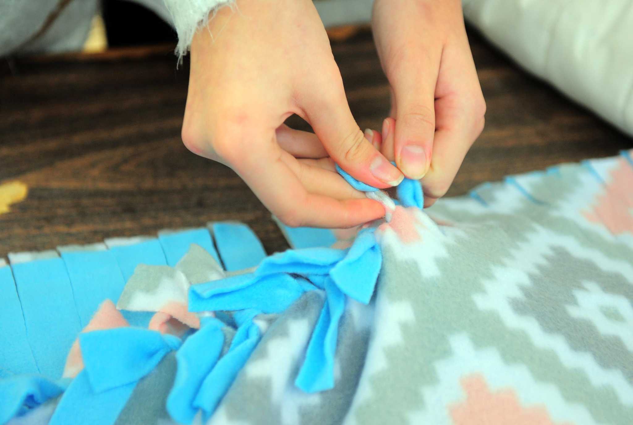 In Photos: Blanket making for kids with cancer