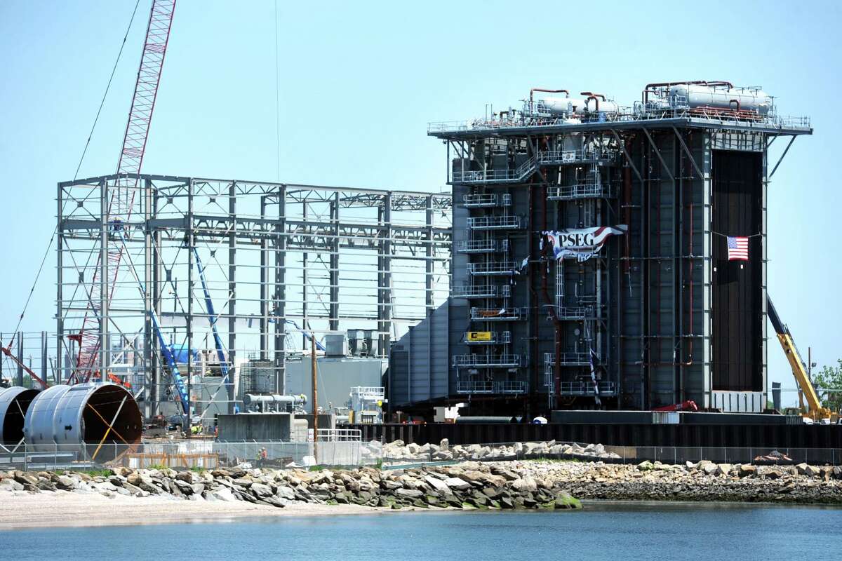 Construction continues on a new natural gas-fired power plant at PSEG’s Bridgeport Harbor Station, in Bridgeport, Conn. May 25, 2018.