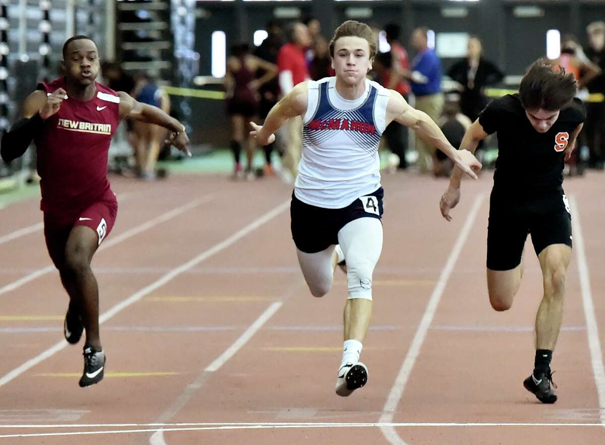 New Haven Connecticut - February 22, 2020: Korey Morton of Brien McMahon H.S. competes in the preliminary 55-meter dash, center, before coming in second during the finals of the CIAC State Open Indoor Track Championship Saturday at the Floyd Little Athletic Center in New Haven.
