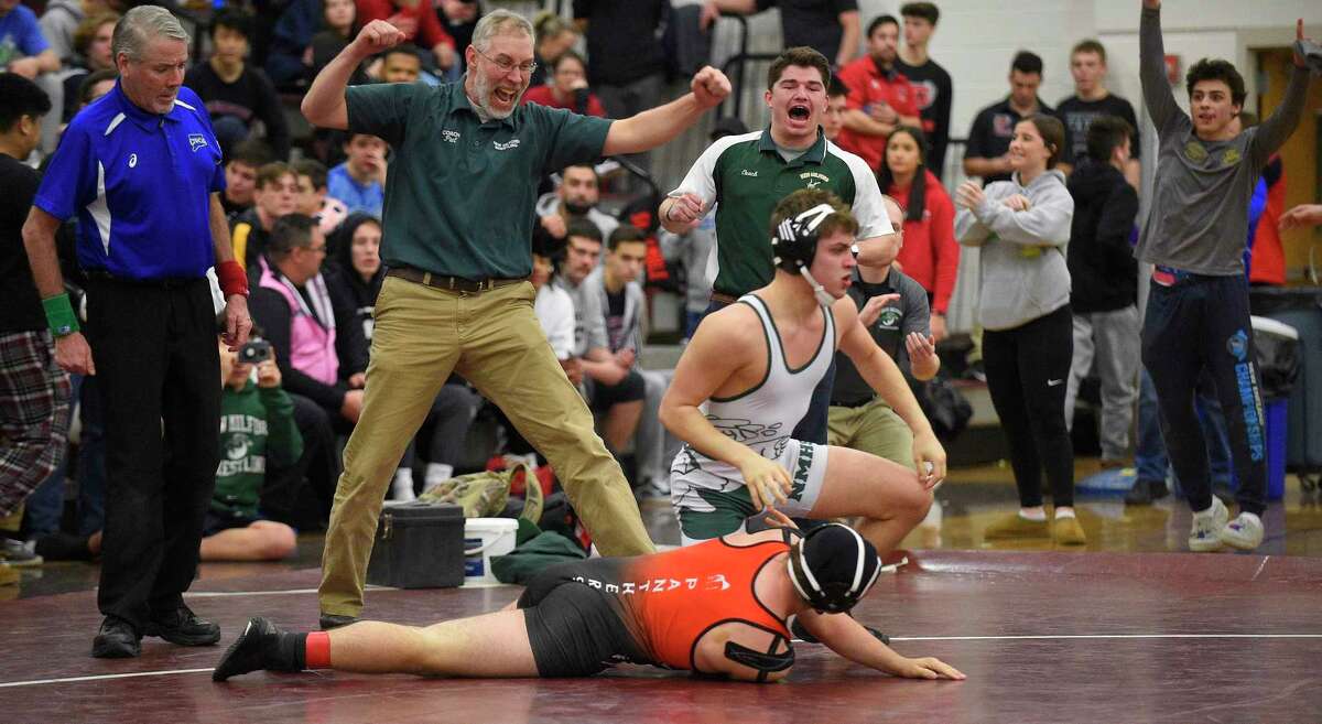 New Milford's Richard Morrell defeats E.O. Smith's Ethan Grous in the 170 pound weight class finals of the CIAC Class L Wrestling tournament on Feb. 22, 2020 at Bristol Central High School in Bristol, Connecticut.
