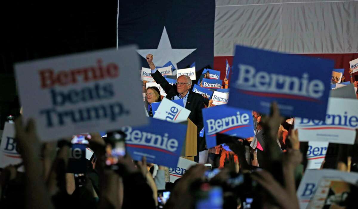 Bernie Sanders greets supporters at a campaign rally at the Cowboys Dance Hall on Saturday, February 22, 2020.