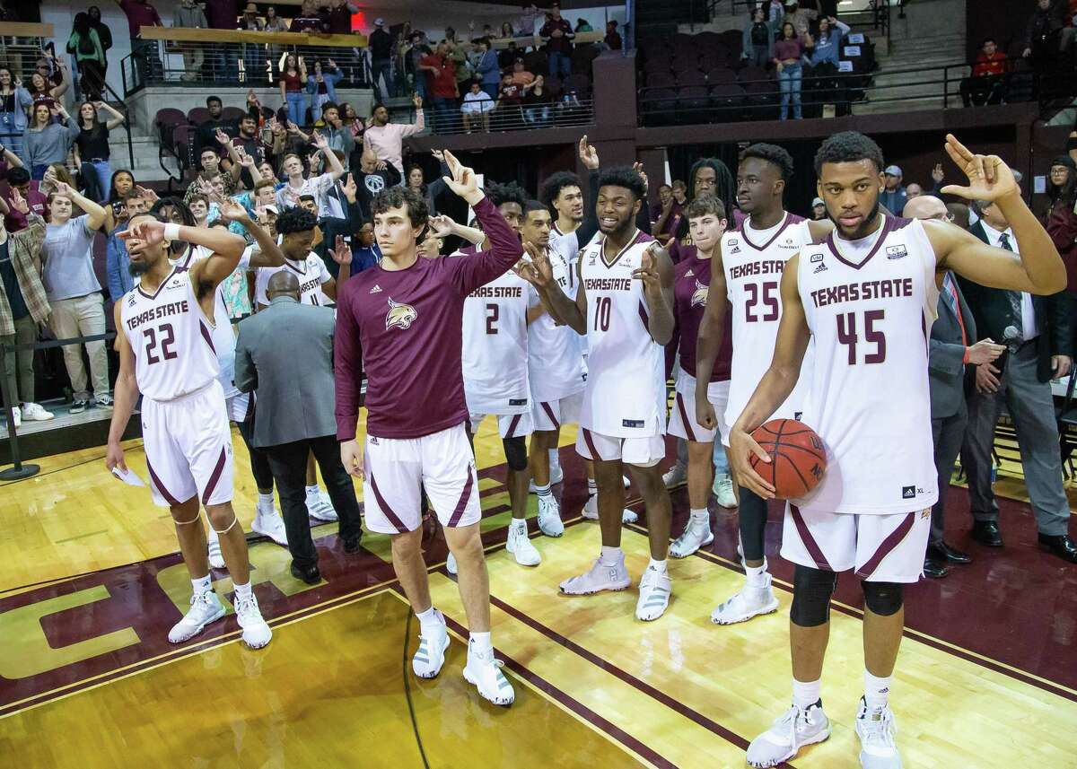 San Marcos, TX; Texas State Bobcats celebrate their win against the Georgia State Panthers with their school song at the NCAA mens basketball game on Saturday, Feb 12, 2020, at the Strahan Arena. [JOHN GUTIERREZ/FOR EXPRESS-NEWS]