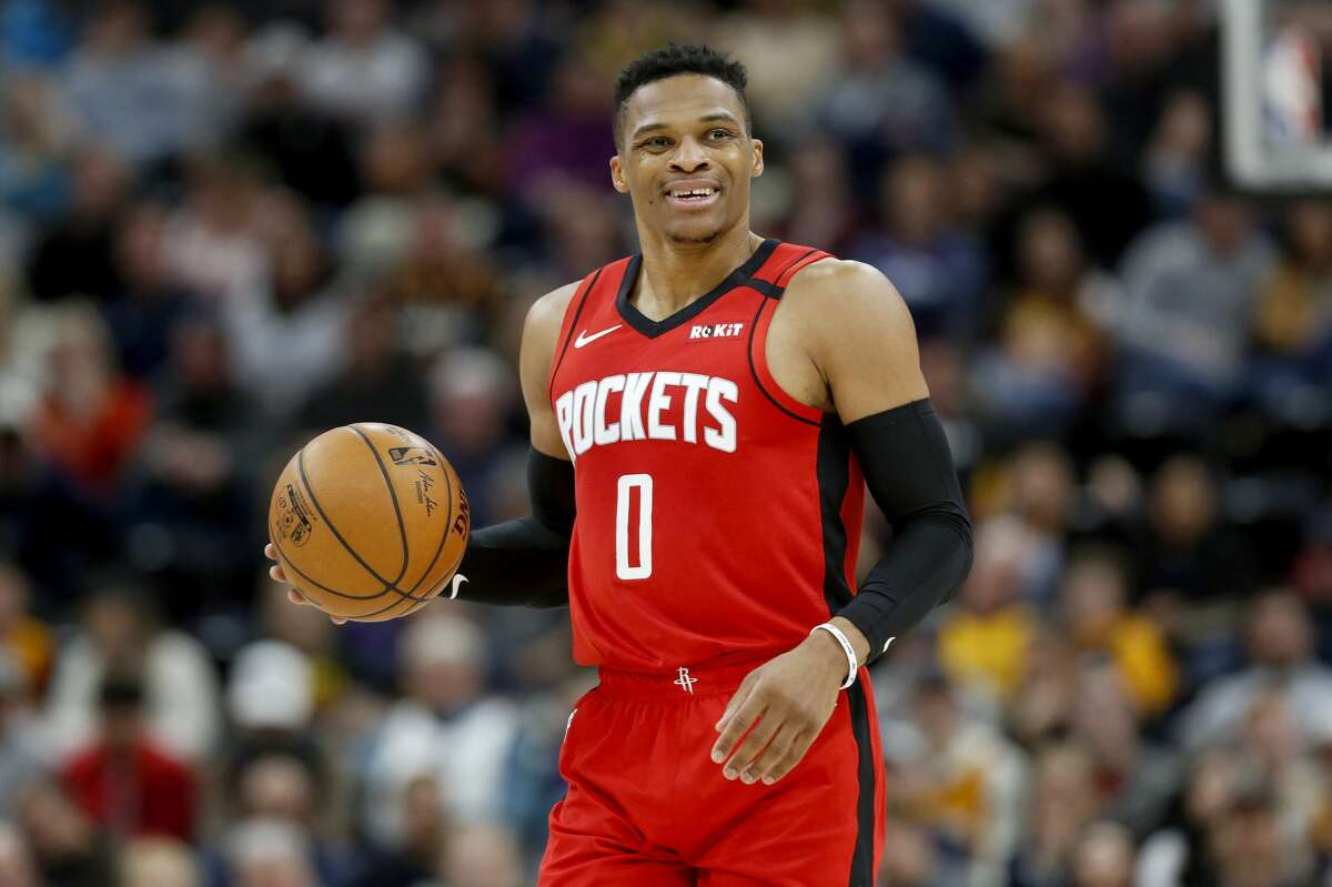 Houston Rockets' Russell Westbrook smiles as his team takes the lead over the Utah Jazz in the first half during an NBA basketball game Saturday, Feb. 22, 2020, in Salt Lake City. The Houston Rockets defeated the Utah Jazz 120-110. (AP Photo/Kim Raff)