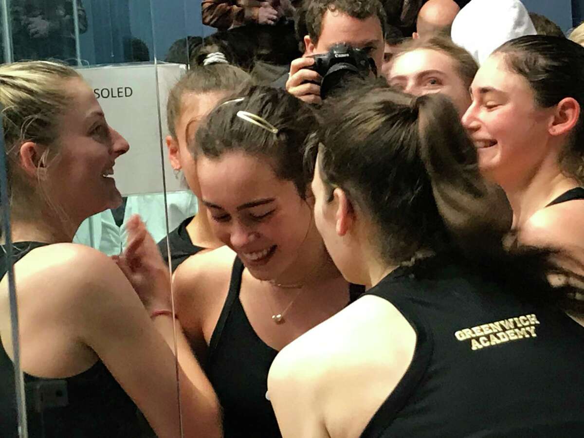 Emma Carney, center, reacts with her teammates, after the Greenwich Academy squash team won the Division I title at the HEAD U.S. High School Team Squash Championships on Sunday, February 23, 2020, at Trinity College in Hartford, Connecticut.