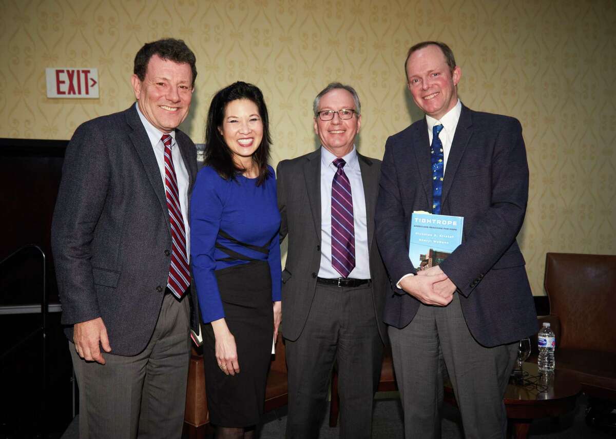 Bestselling authors Nicholas Kristof and Sheryl WuDunn, with Family Centers President and CEO Bob Arnold and Greenwich Time editorial page editor John Breunig at the 'Titan Series' breakfast to benefit Family Centers of Greenwich.