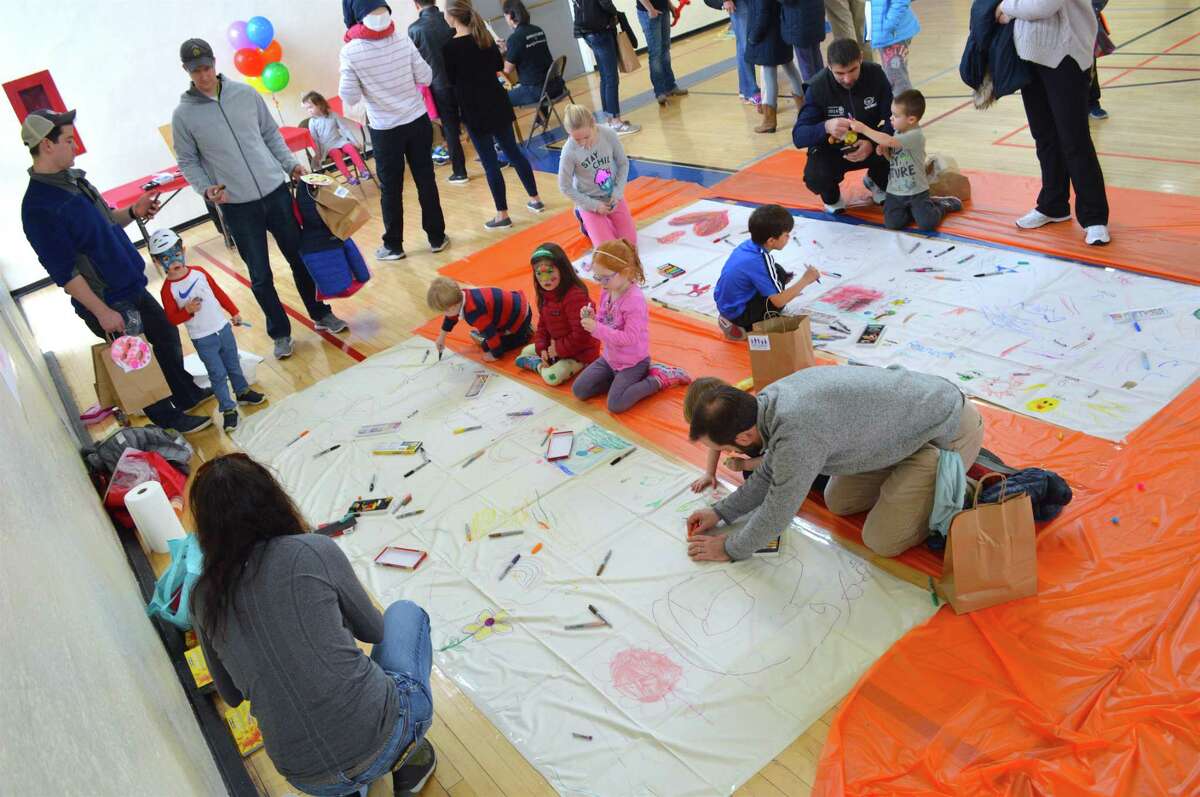 Visitors took part in making murals at a previous Community Art Festival at Town Hall.