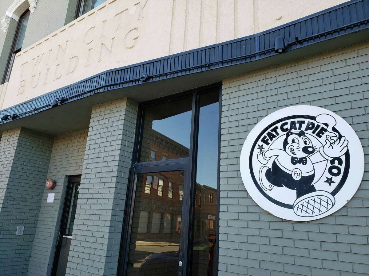 Fat Cat’s home, the historic Twin City Building in Norwalk, has been sold.