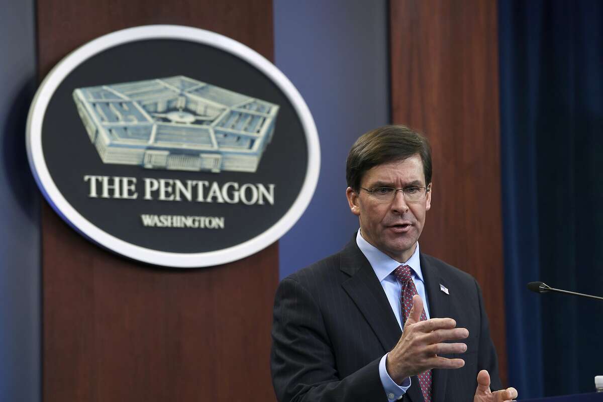 FILE - In this Dec. 20, 2019, file photo Defense Secretary Mark Esper speaks during a news conference at the Pentagon in Washington. The Pentagon is adopting new ethical principles as it prepares to accelerate its use of artificial intelligence technology on the battlefield. (AP Photo/Susan Walsh, File)
