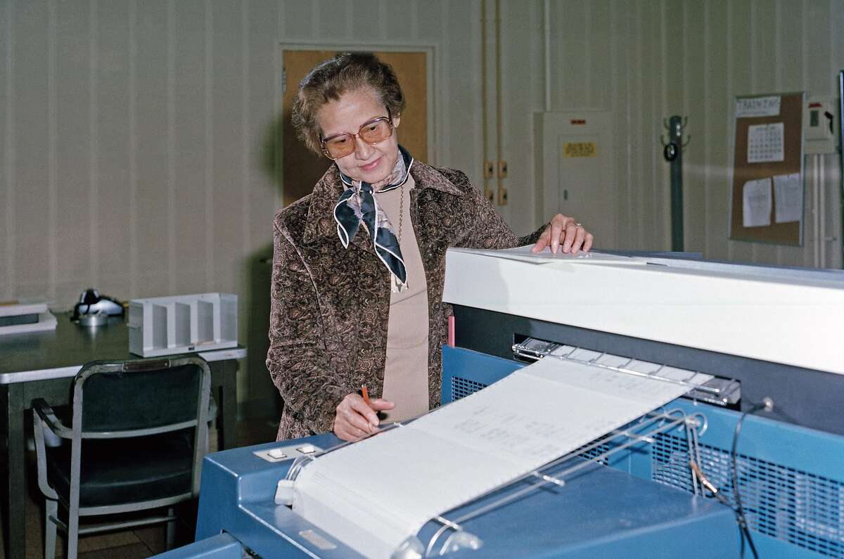 FILE -- A photo provided by NASA shows Katherine Johnson at work at NASA's Langley Research Center in Hampton, Va., in 1980. Johnson, one of a group of black women mathematicians at NASA and its predecessor who were celebrated in the 2016 movie "Hidden Figures," died on Monday, Feb. 24, 2020, in Newport News, Va. She was 101. (NASA via The New York Times) **EDITORIAL USE ONLY**