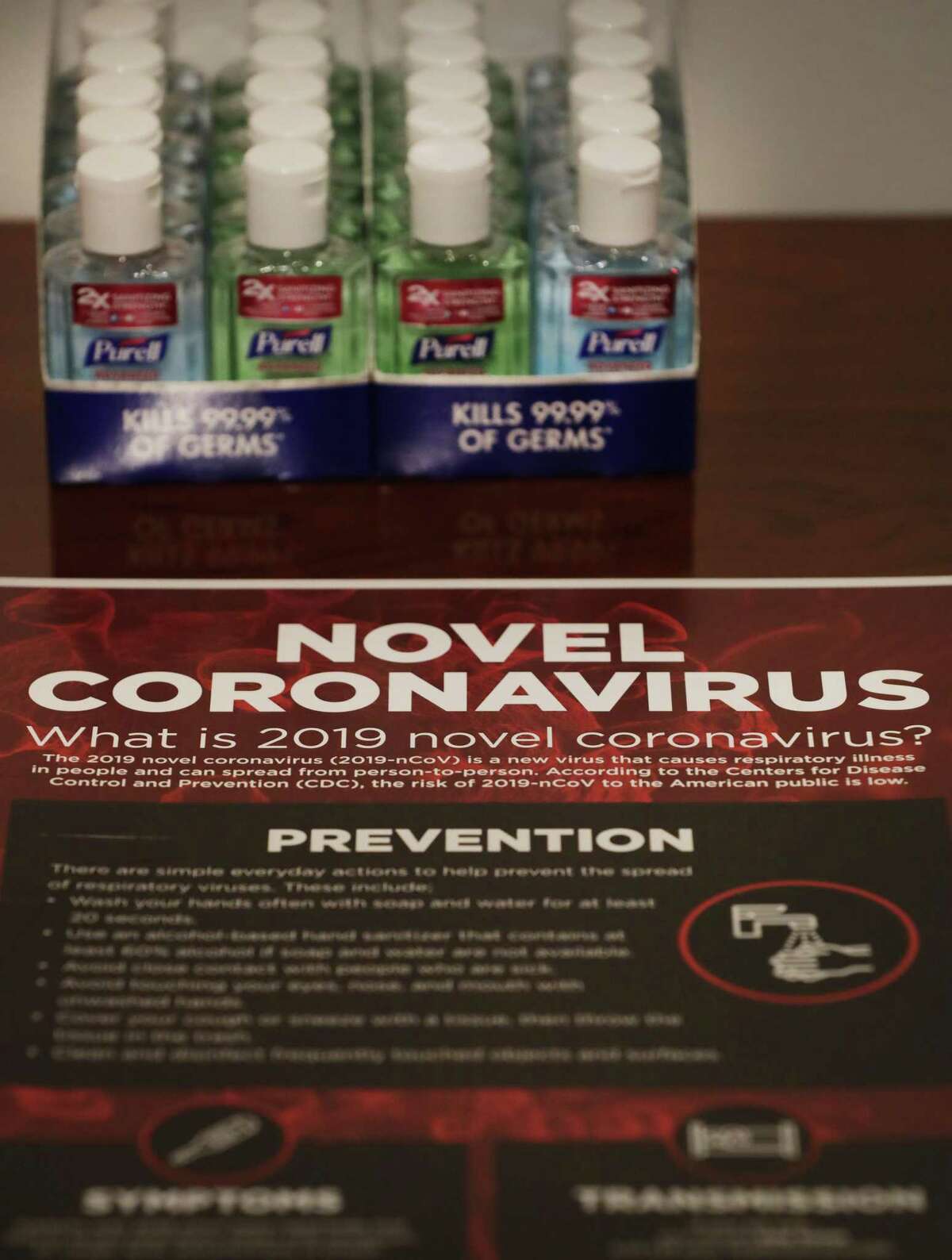 Small bottles of hand sanitizer and information about the novel coronavirus are displayed at a news conference where San Antonio officials answered questions about the coronavirus and the evacuees from a cruise ship who are under quarantine at Joint Base San Antonio-Lackland.