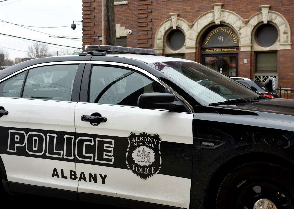 An Albany police car is parked outside the Albany Police Department South Station on Tuesday, Feb. 25, 2020, in Albany, N.Y. (Will Waldron/Times Union)