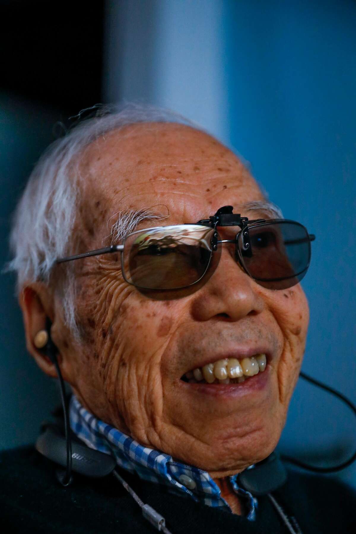 Chia Liang LI watches a video that uses 3scape, an immersive 3D experience while wearing special clip-on glasses at the Sunny View Bay Area Retirement Center on Wednesday, Feb. 12, 2020 in Cupertino, California.