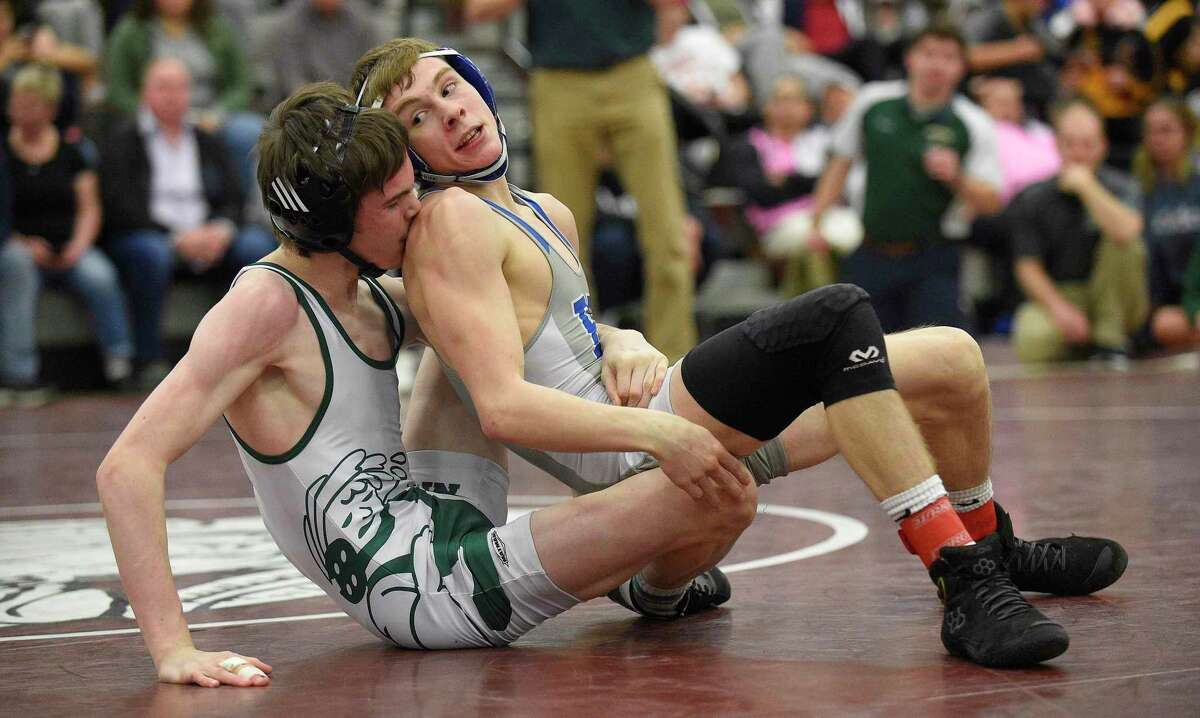 New Milford's Evan Linder wrestles Bristol Eastren's Trent Thompson in the 106 pound weight class finals of the CIAC Class L Wrestling tournament on Feb. 22, 2020 at Bristol Central High School in Bristol, Connecticut.
