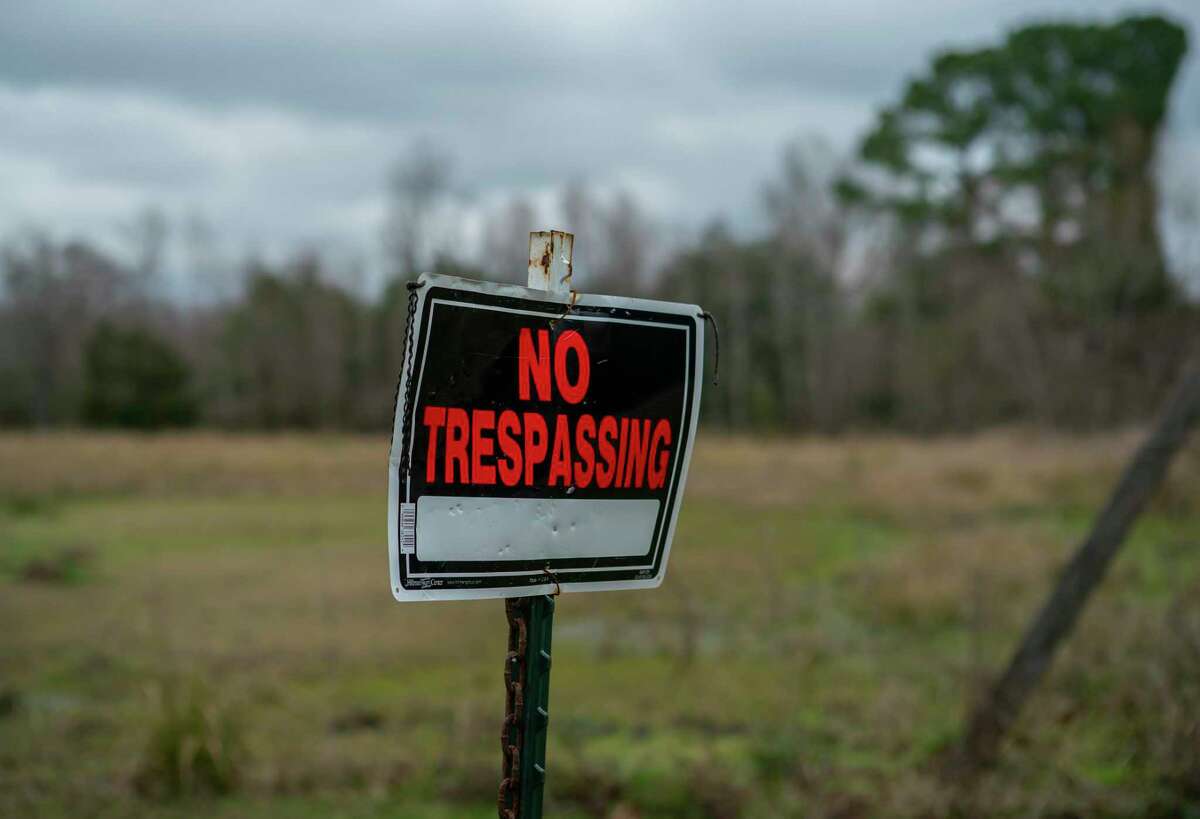A "No Trespassing" sign can be seen on the driveway of a home where Christine Rollins was reportedly killed by wild hogs late last year, Thursday, Jan. 30, 2020, in Anahuac.