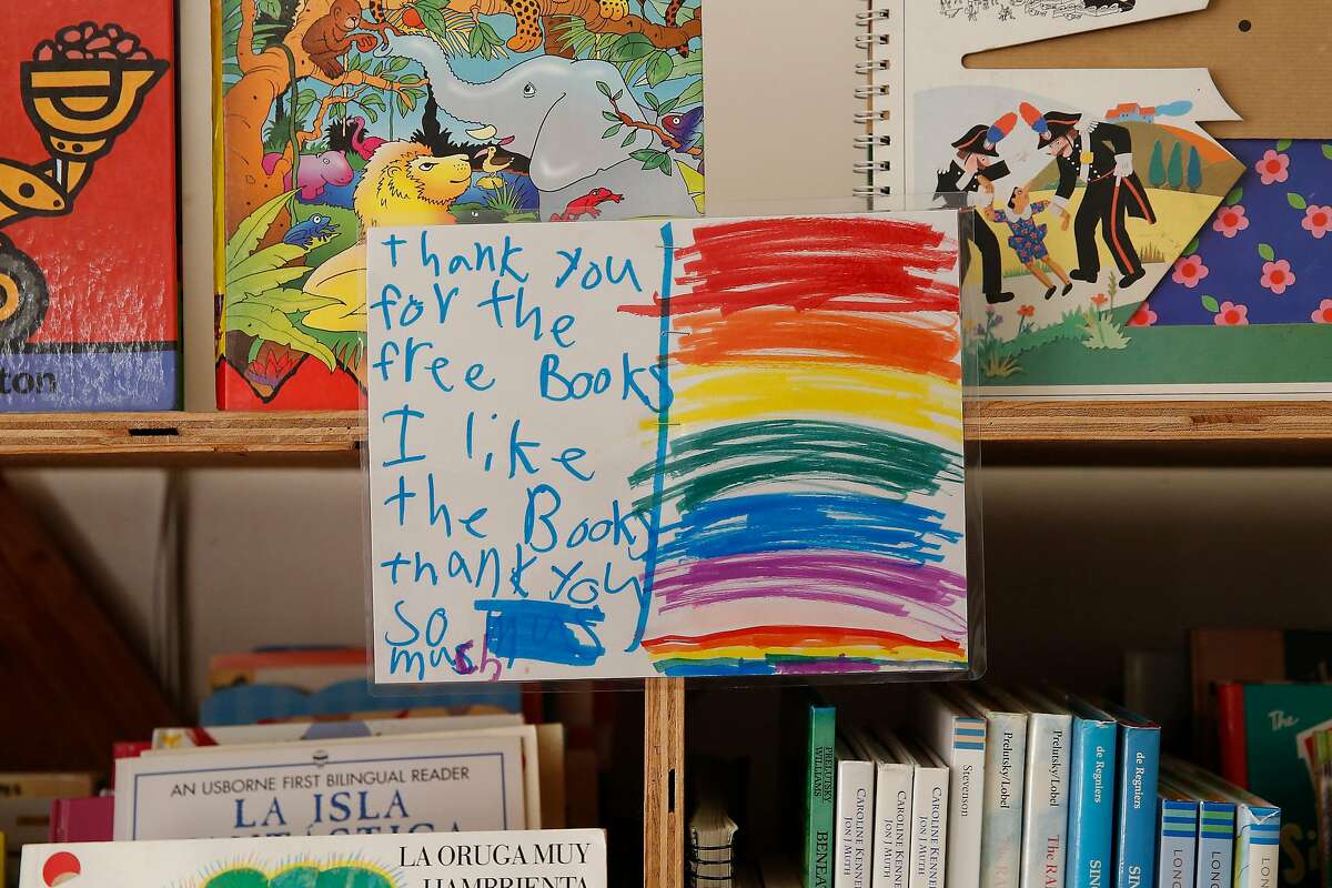 A thank you note from a recipient of books from the Children’s Book Project is displayed on a book shelf at the Children’s Book Project on Monday, February 24, 2020 in San Francisco, Calif.