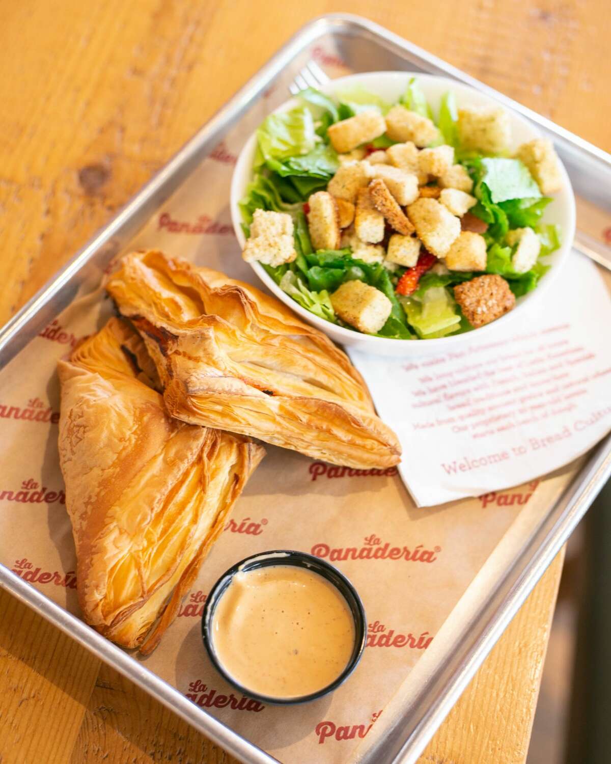 La Panaderia 2 tuna empanadas and a salad $10.50 301 E. Houston St. & 8305 Broadway St.