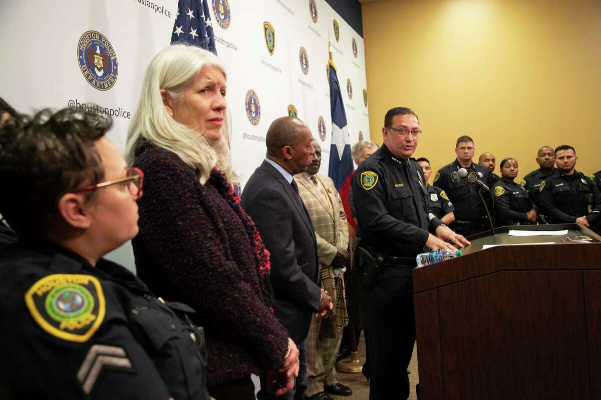 Police Chief Art Acevedo, center, accompanied by Mayor Sylvester Turner, some members of the city council and some officers of the Houston Police Department, discusses the annual “March on Crime/Lucha Contra El Crimen” initiative at the Houston Police Department Headquarters on Tuesday, Feb. 25, 2020, in Houston.