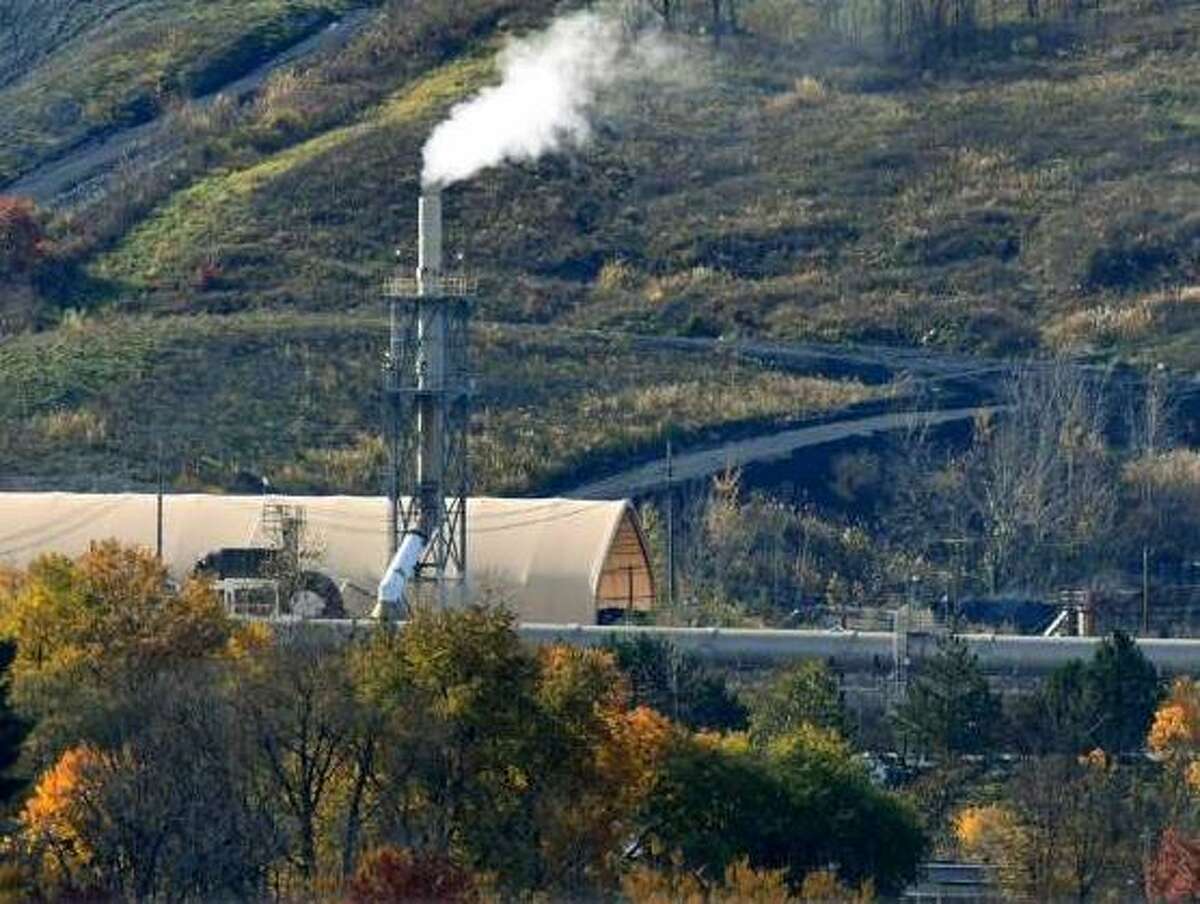 Emissions rise from the Norlite plant on Wednesday, Nov. 7, 2018, in Cohoes, N.Y. Owners of the state's only commercial hazardous waste incinerator are announcing a $30 million project to upgrade pollution control equipment.