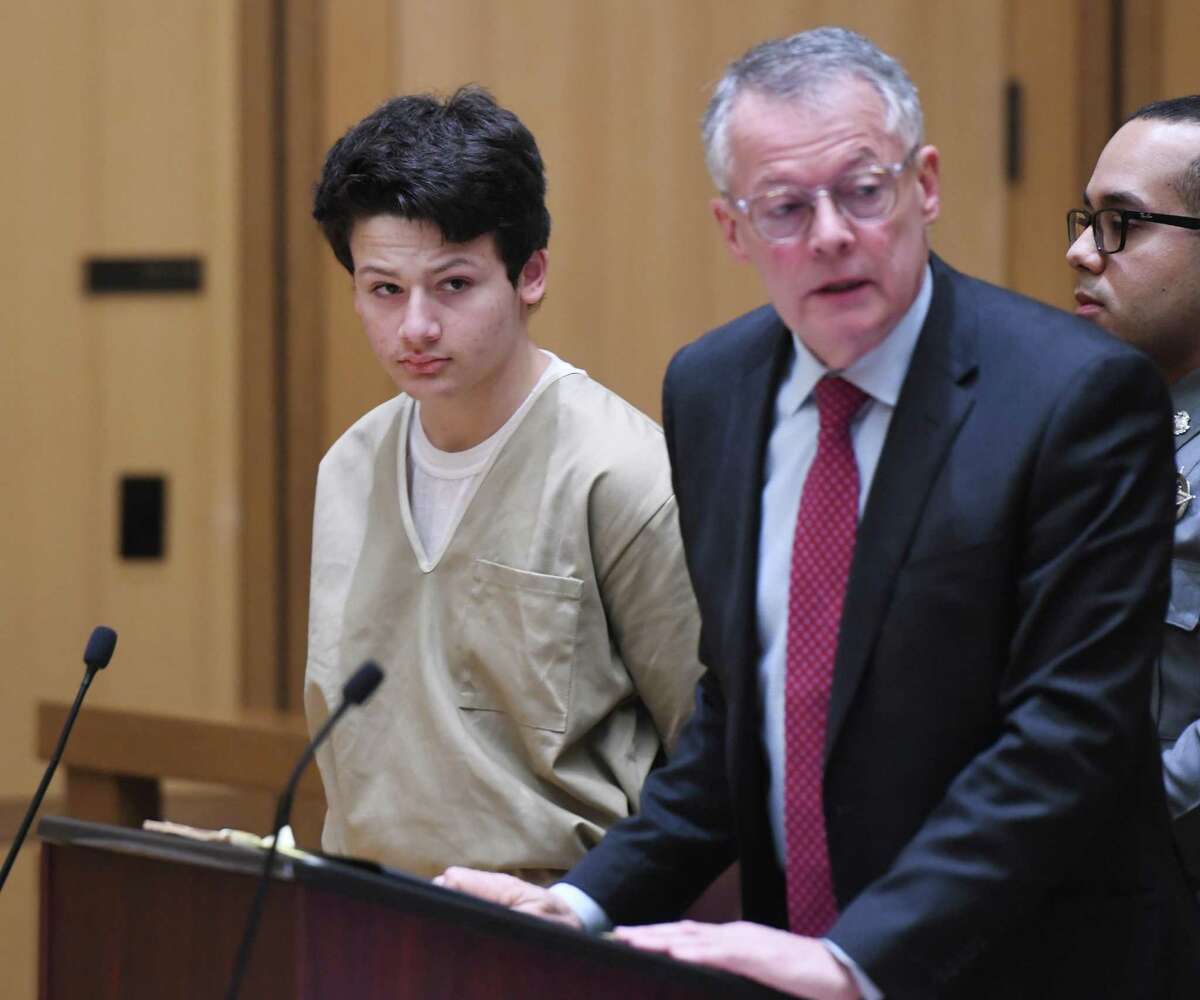 Guilford's Ellis Tibere, 18, who is accused of attempted murder, appears with his attorney John Gulash for a motion to lower Tibere's bond at state Superior Court in Stamford on Monday. The judge upheld the current bond at $1 million. Tibere is charged with attempted murder after allegedly repeatedly stabbing a 33-year-old Greenwich woman in her car in Westport.
