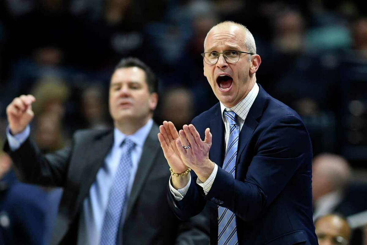Connecticut head coach Dan Hurley cheers on his team during the second half of an NCAA college basketball game against South Florida Sunday, Feb. 23, 2020, in Storrs, Conn. (AP Photo/Stephen Dunn)