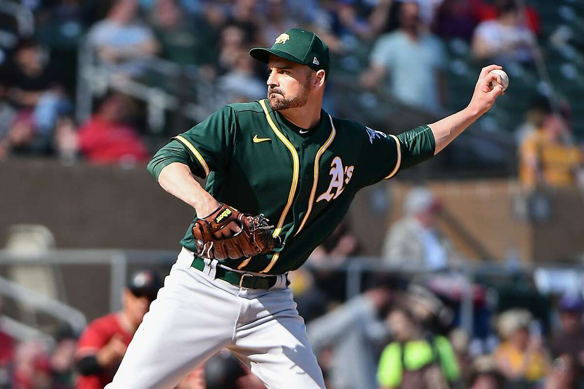 COTTSDALE, ARIZONA - FEBRUARY 23: T.J. McFarland #38 of the Oakland Athletics delivers a pitch during the spring training game against the Arizona Diamondbacks at Salt River Fields at Talking Stick on February 23, 2020 in Scottsdale, Arizona.