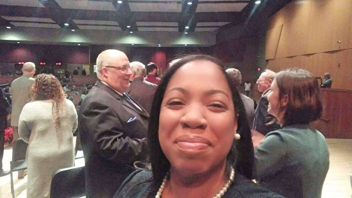 Town Councilman Joy Colon snaps a selfie at the Trumbull swearing-in ceremony Dec. 4 2019.