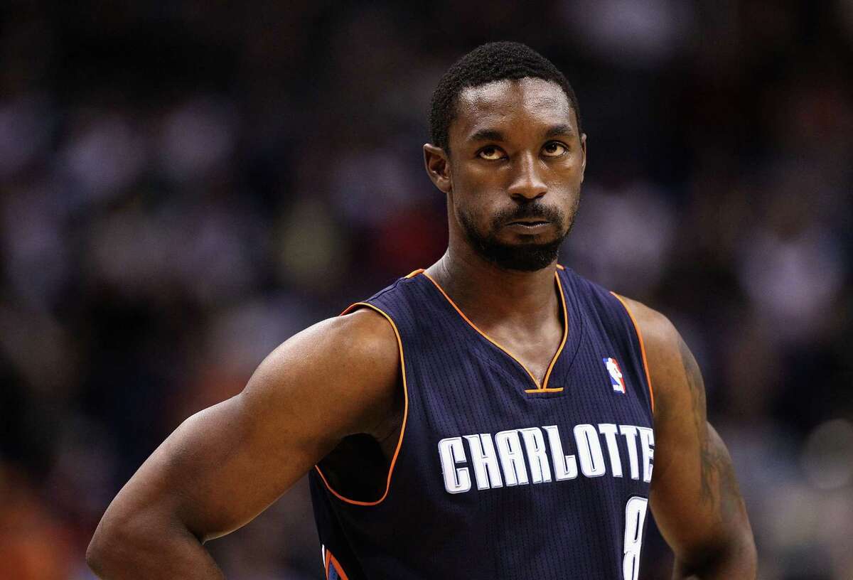 PHOENIX, AZ - DECEMBER 19: Ben Gordon #8 of the Charlotte Bobcats reacts during the NBA game against the Phoenix Suns at US Airways Center on December 19, 2012 in Phoenix, Arizona. The Suns defeated the Bobcats 121-104. NOTE TO USER: User expressly acknowledges and agrees that, by downloading and or using this photograph, User is consenting to the terms and conditions of the Getty Images License Agreement. (Photo by Christian Petersen/Getty Images)