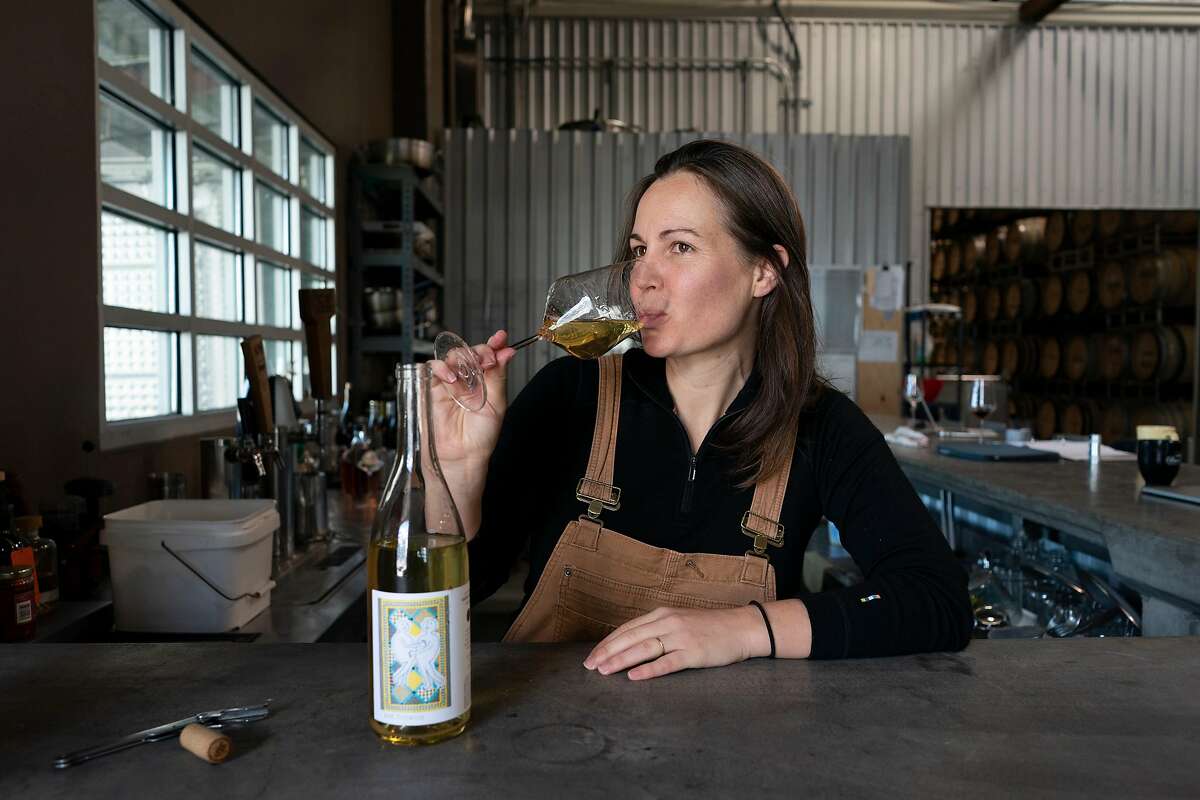 Martha Stoumen sips a glass of her wine where she works in Sebastopol, California.
