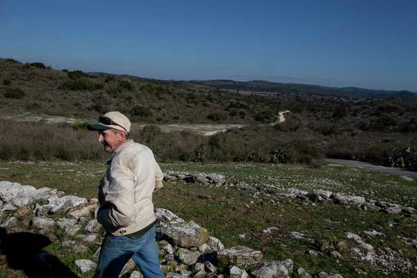 Bill Cofer walks outside the Frio Bat Cave on the Annandale Ranch in Sabinal. The San Antonio Water System bought a conservation easement on the ranch to protect the Edwards Aquifer, the city’s largest water source.