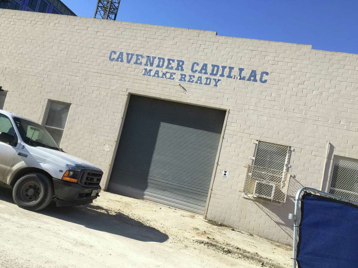 A garage at 203 8th Street that served the Cavender Cadillac dealership on Broadway, might have a future as a food hall, according to documents filed with the state. The project is named the Make Ready Dining Hall, and it is located behind the Soto (in the background), a six-story complex undergoing construction.