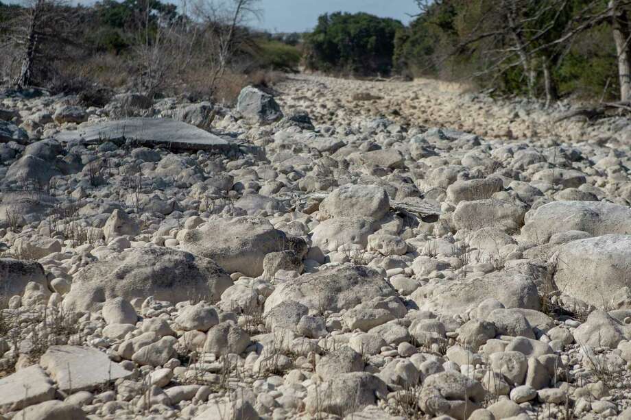 The Frio River briefly disappears as it flows underground into the Edwards Aquifer on the Dripstone Ranch. To protect the river runoff here, the Edwards Aquifer Protection Program spent $7.9 million for a conservation easement on the ranch. Photo: Josie Norris, Staff Photographer / **MANDATORY CREDIT FOR PHOTOG AND SAN ANTONIO EXPRESS-NEWS/NO SALES/MAGS OUT/TV