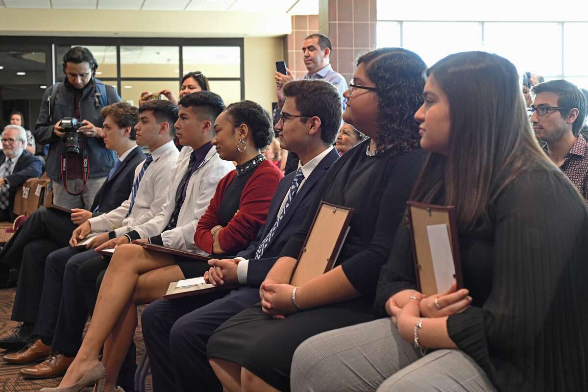 Recipients of the Mr. South Texas scholarship wait for a group photo after receiving their scholarship and recognition at the Zaffirini Student Success Center Tuesday.