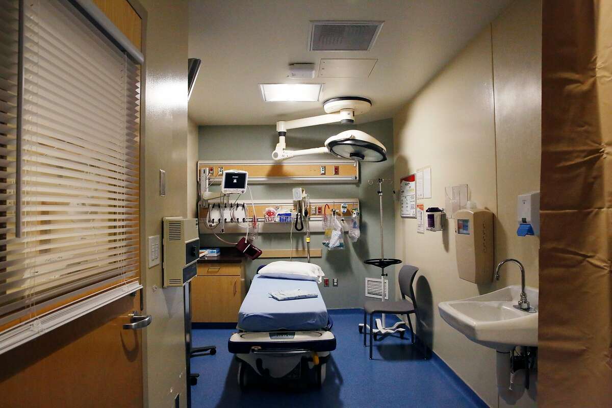 A negative pressure treatment room is seen at Saint Francis Memorial Hospital on Tuesday, February 4, 2020 in San Francisco, Calif. The rooms have a separate air circulation system then the rest of the hospital. Air goes out a vent in the room (center bottom background) and is brought in through a vent on the ceiling (top center).