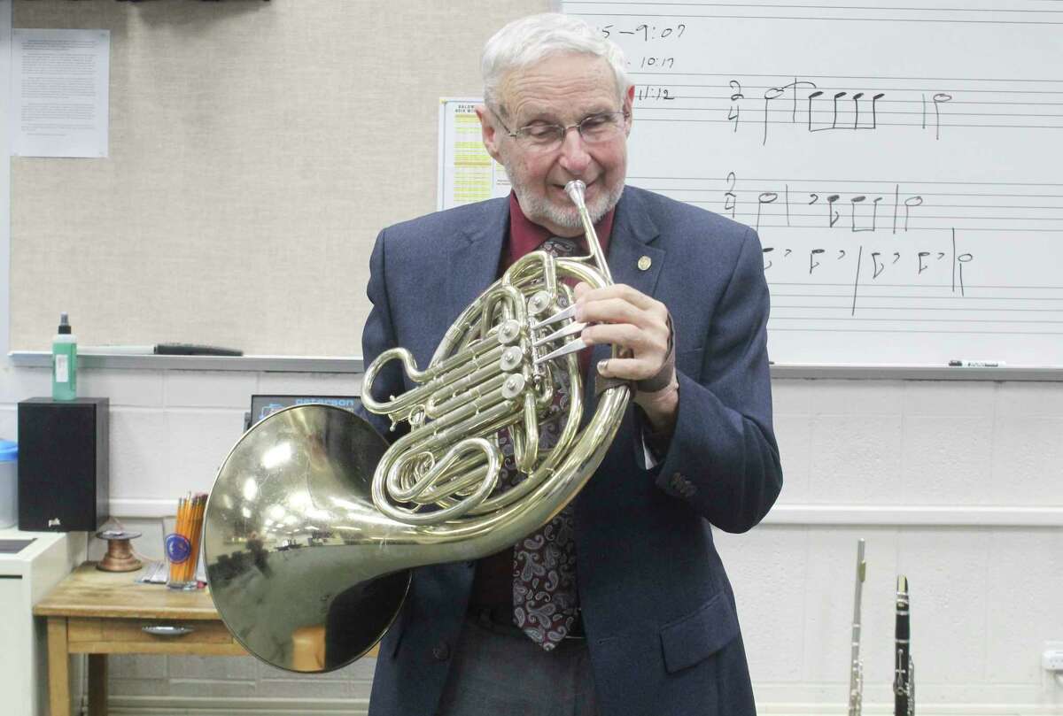 Longtime music director Dave Bass is pictured playing his french horn. While he plays a variety of instruments, he said this one is his favorite. (Star photo/Catherine Sweeney)