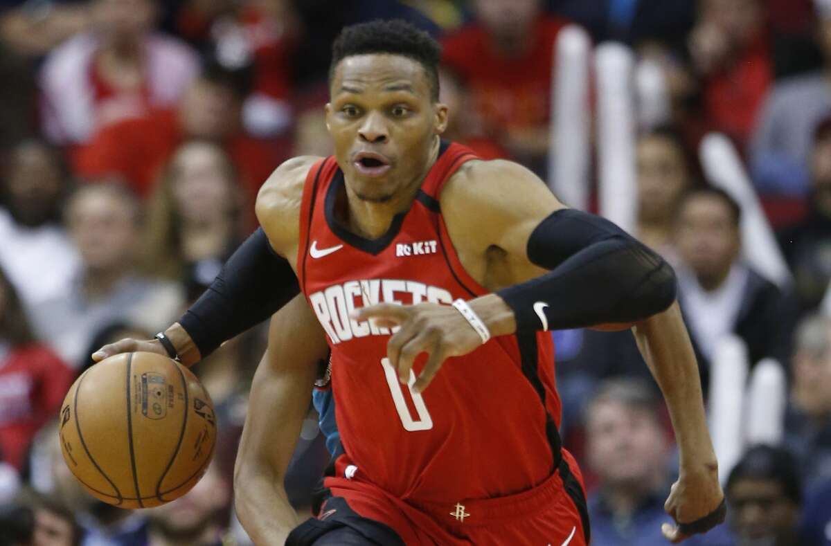 Houston Rockets guard Russell Westbrook sprints the ball up the court after grabbing a rebound against the Memphis Grizzlies during the second half of an NBA basketball game on Wednesday, Feb. 26, 2020, at Toyota Center in Houston.