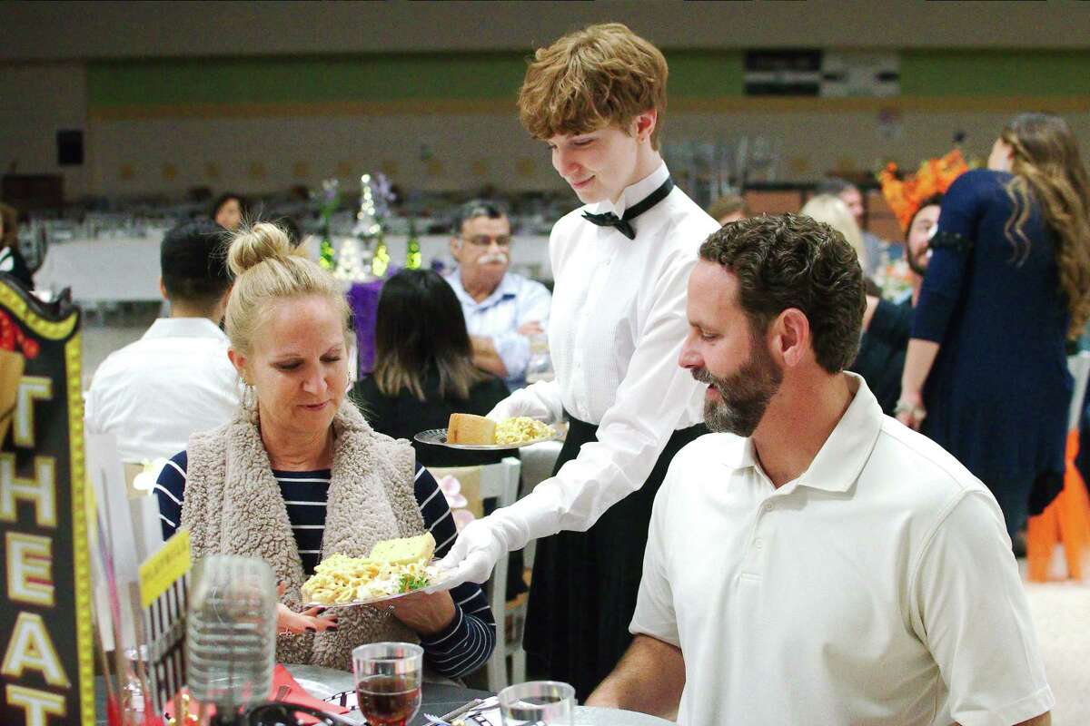 Alyssa Godfrey serves her parents Erica and Jason during a Deer Park High School Project Graduation dinner fundraiser. Next up is a mattress sale, scheduled for Saturday, March 21. Any business, organization or individual who would like to donate funds, gift cards, merchandise or services for Project Graduation may call 281-250-4463.