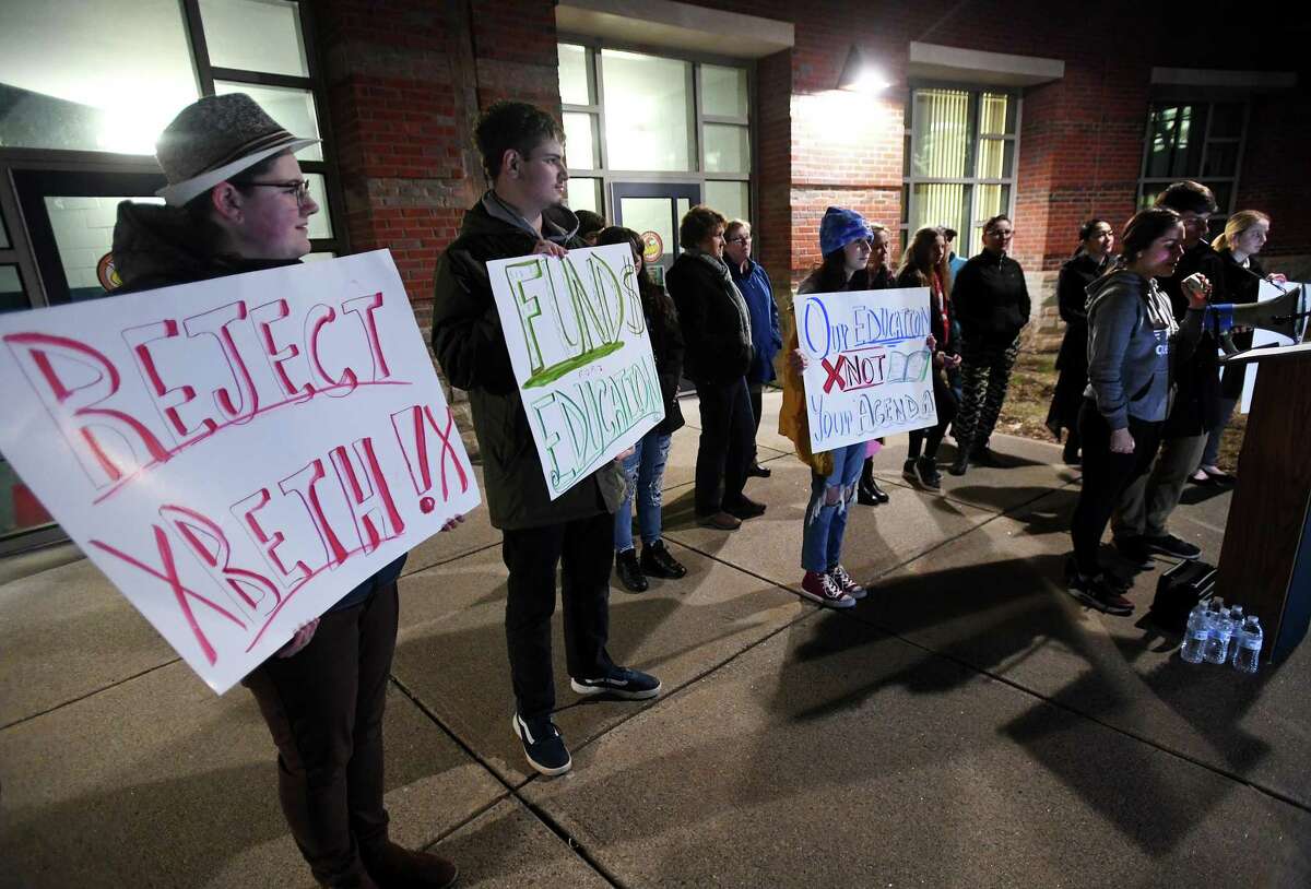 Shelton High students with the group SHS Students Fight for Change protest the appointment of Beth Smith as superintendent on Feb. 26.