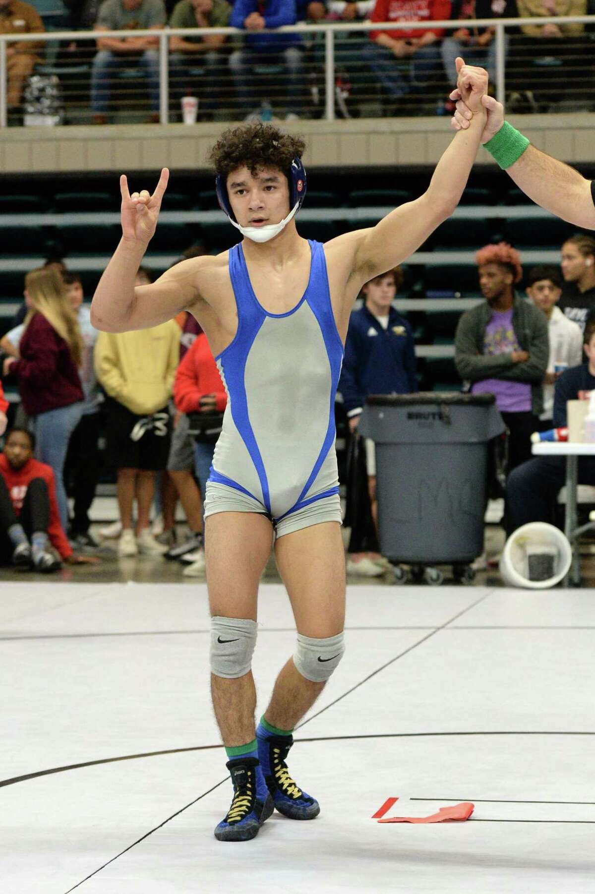 Christian Lopez of Houston Westside wins first place in the boys 120 pound weight class during the Region III 6-A UIL Wrestling Championships on Saturday February 15, 2020 at the Leonard Merrell Center, Katy, TX.