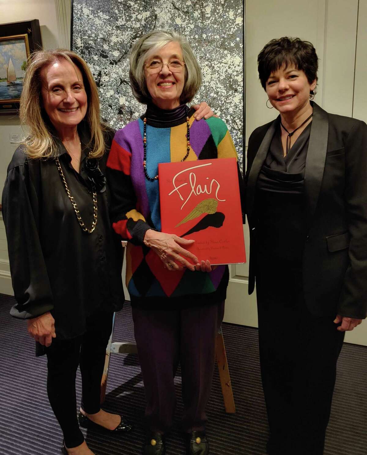 Suzanne Simpson, center, received the Art Society of Old Greenwich’s JohnTatge Memorial Volunteer of the Year Award Feb. 21 at ASOG’s 2020 Winterfest dinner and art show at the Riverside Yacht Club. ASOG co-presidents Elaine Conner, left, and Julie DiBiase presented the award for Simpson’s exceptional volunteer service in chairing the 2019 ASOG Sidewalk Show and Sale.