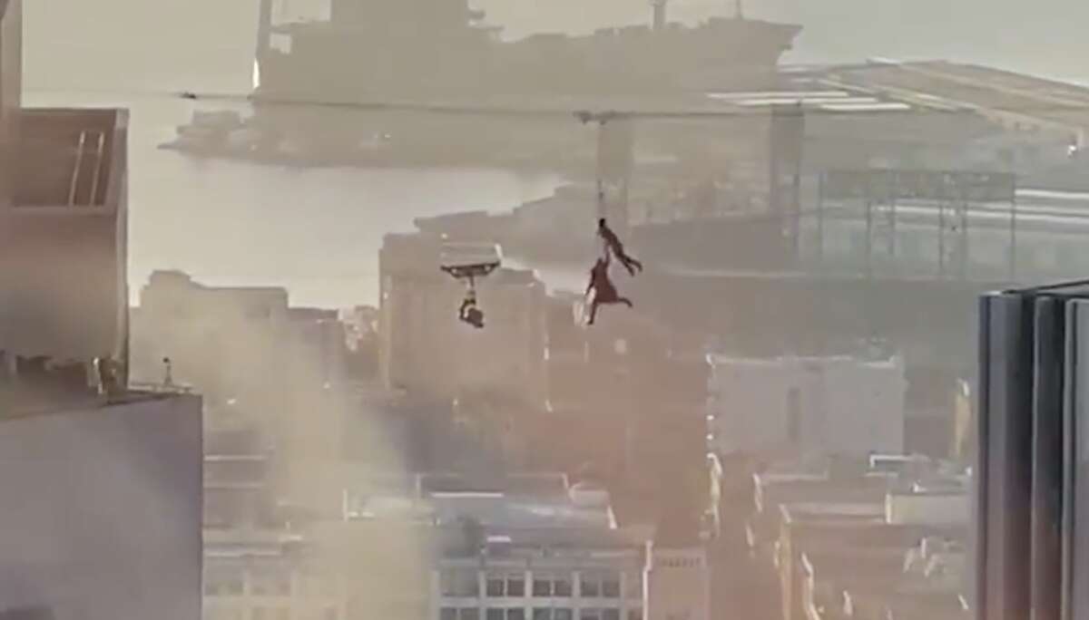 Two people were seen shooting a Matrix 4 scene high up between buildings in downtown San Francisco on Thursday, February 27, 2020.