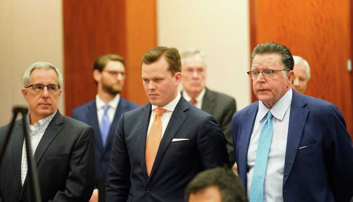Michael Keough, Arkema retired vice president of logistics, left, and his defense attorneys Cordt Akers and Dan Cogdell, right, are shown during the Arkema Inc. criminal trial at Harris County Criminal Courthouse 1201 Franklin St., Thursday, Feb. 27, 2020.