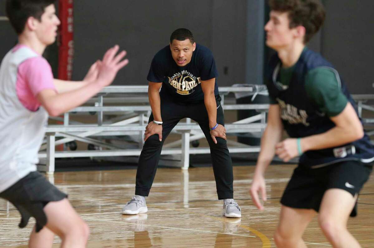 Basketball head coach Forrest Blackwell oversees team practice on Wednesday, Feb. 26, 2020. The St. John Paul II Catholic High School men's basketball team is making its TAPPS state-tournament debut on Friday.